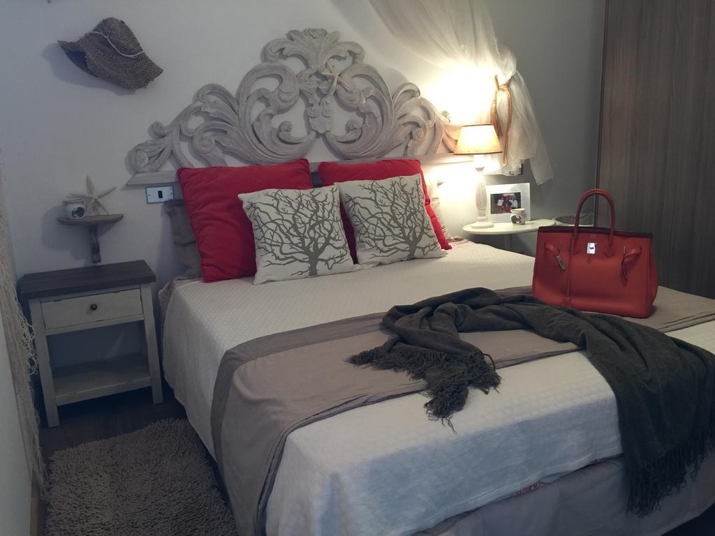 Smeralda Residenza Di Charme Portisco Habitación foto