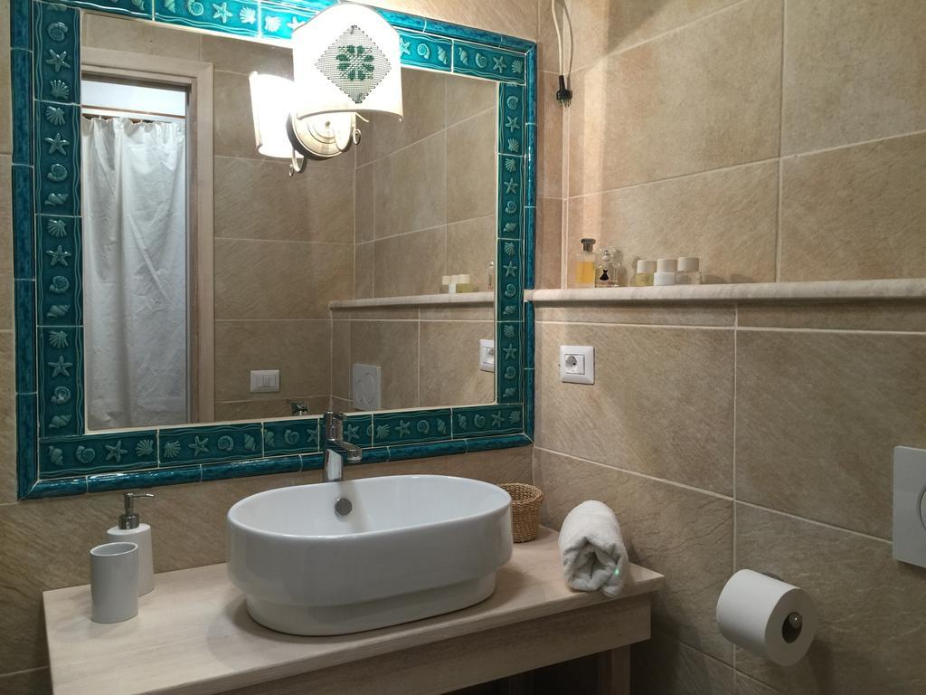 Smeralda Residenza Di Charme Portisco Habitación foto
